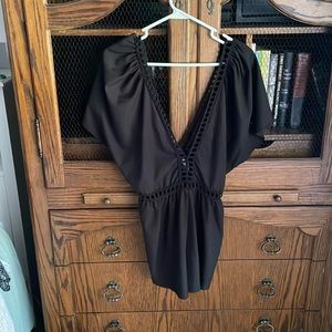 Open back, black romper